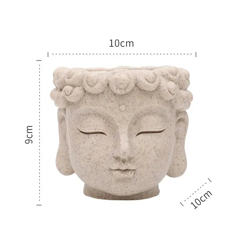 a white buddha statue with its eyes closed