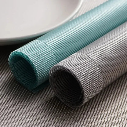 a close up of a table with a plate and a napkin