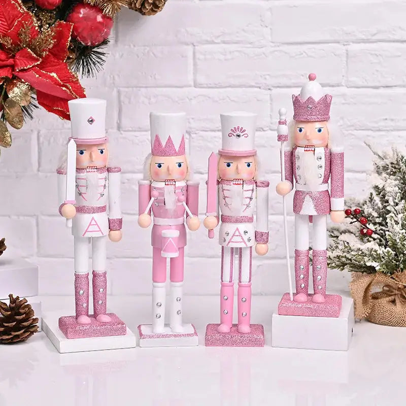 a group of nutcrackers standing next to a christmas tree