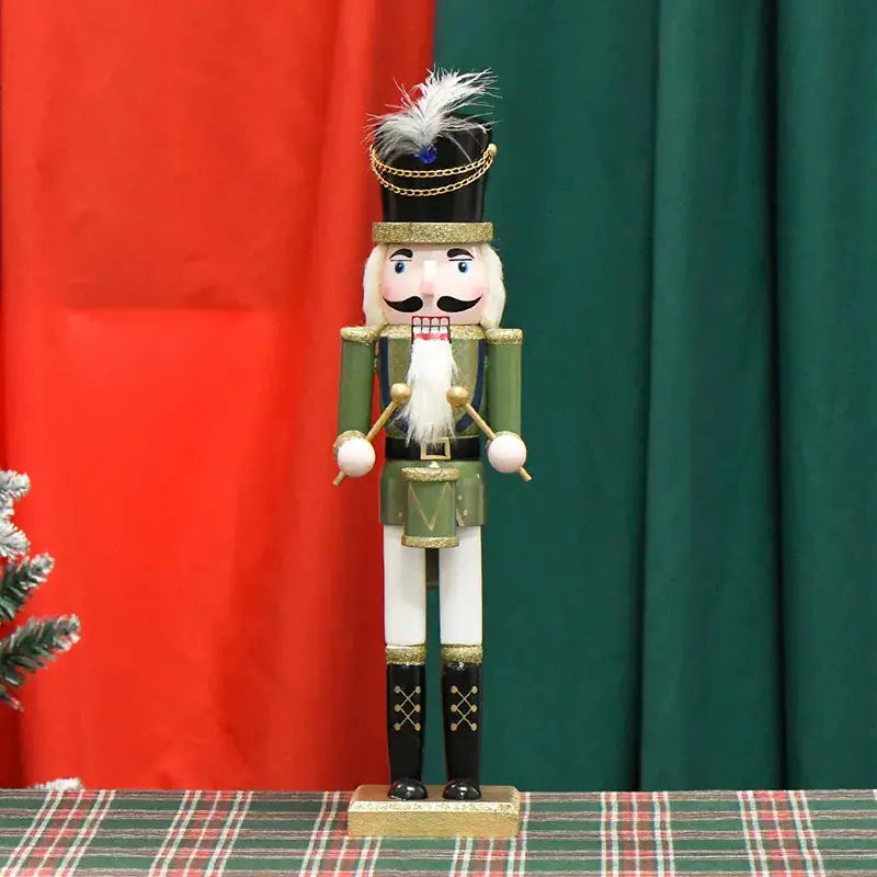 a nutcracker is standing next to a christmas tree