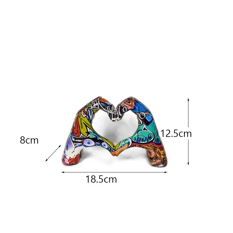 a colorful heart shaped object on a white background