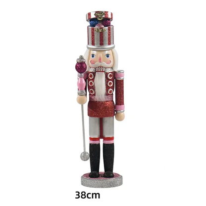 a christmas nutcracker ornament on a white background