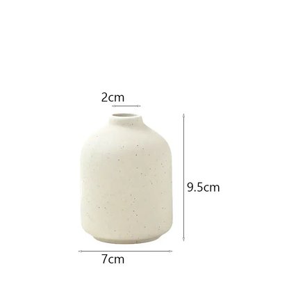 a white vase is shown with measurements for it